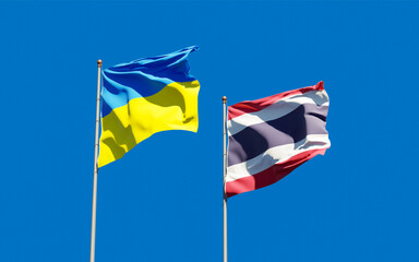 Flags of Ukraine and Thailand.