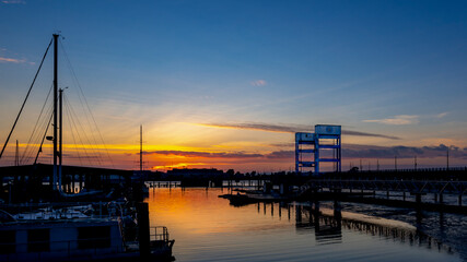 Fototapeta na wymiar Mare Island bridge towers seen from the marina on a beautiful sunset