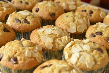 Tasty homemade banana cup cake with almond slice and choc chip.