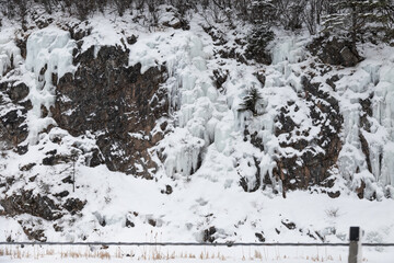 Icy rock cliff