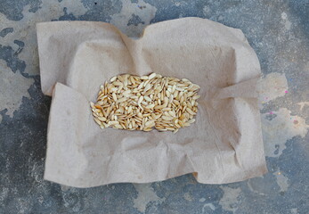 Closeup Melon seeds are in brown paper