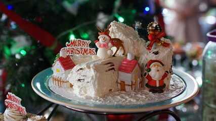 Beautiful Christmas cake decoration with Santa Clauses