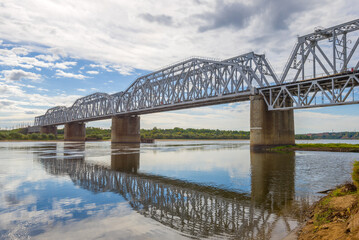 Railway bridge over the Vyatka river on a cloudy September day. Kotelnich, Russia