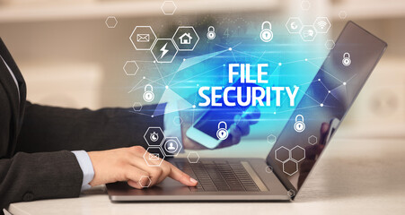 FILE SECURITY inscription on laptop, internet security and data protection concept, blockchain and cybersecurity