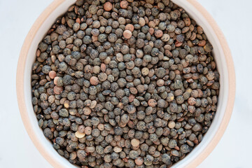 Close-up of a bowl of raw lentils