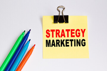 Text STRATEGY MARKETING on a sticker. Could be for business, financial and marketing concepts