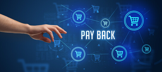 Close-Up of cropped hand pointing at PAY BACK inscription, online shopping concept