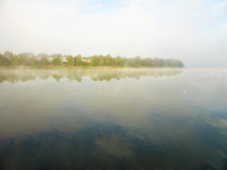 Algae and clouds in the Volga River. And there's a fog over the river