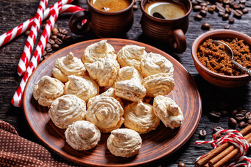 Meringue cookies on a dark wooden background