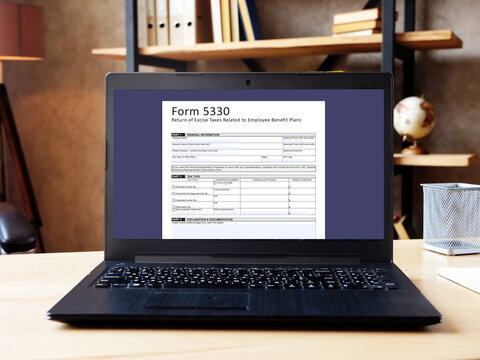 Business concept about  Form 5330 Return of Excise Taxes Related to Employee Benefit Plans   with sign on the sheet.