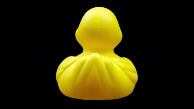 A toy rubber duck rotating around