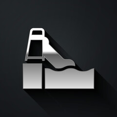 Silver Water slide with pool icon isolated on black background. Aquapark. Long shadow style. Vector.