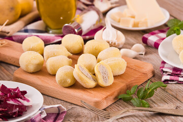 Potato gnocchi stuffed with radicchio and ricotta.
