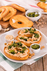 Friselle with turnip tops and hummus.