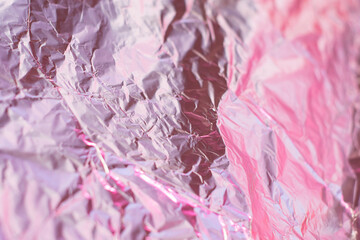 Aluminum abstract background in neon glow. Stylish background.