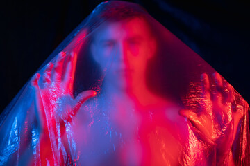 Air pollution. Defocused portrait. Nature protection. Climate disaster. Disturbed trapped isolated...