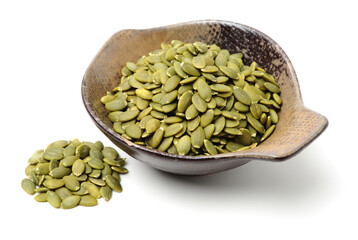 Pumpkin seeds on a white background