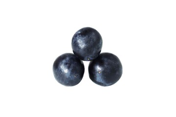 Three blue grapes isolated on white background