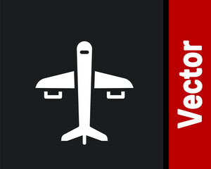 White Plane icon isolated on black background. Flying airplane icon. Airliner sign. Vector.