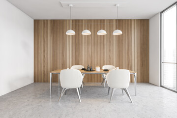 White and wooden dining room interior