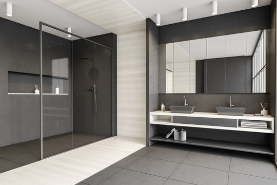 Grey and white bathroom with shower, two sinks and mirror