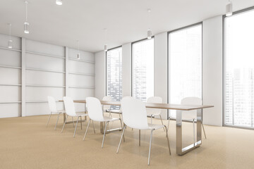 Fototapeta premium White conference room with windows, white chairs and table