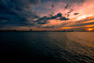 The background of the bridge stretches into the sea, with twilight light in the morning, beautiful colors, sky wallpaper and refreshing surroundings.
