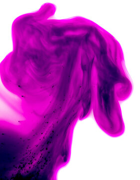 Spots of red potassium permanganate on a white background.