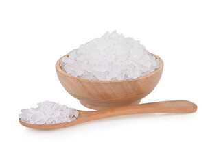 natural rock sugar in a wooden cup   isolated on white background.