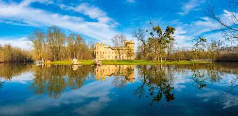 Panoramic view of Janohrad (also known as Januv Hrad) - ancient ruin above river with magic reflection in water. Part of Lednice Valtice UNESCO areal. Czech Republic, Sputh Moravia region.
