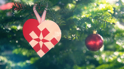 typical danish christmas decoration made of paper, shallow depth of field
