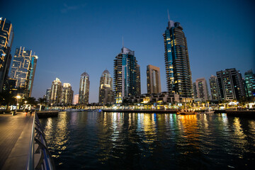 UAE, Dubai - December, 2020: Dubai Marina illuminated at night. United Arab Emirates