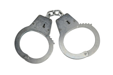 Police handcuffs isolated on white background without shadows. Pair of real metal handcuffs macro...