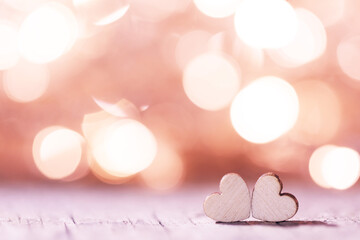 Two hearts on bokeh background