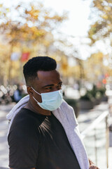 African American with a covid 19 mask