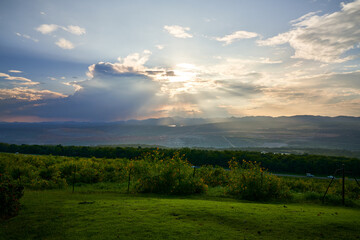 Fototapeta na wymiar Landscape view of mae mo lampang with sun light rays and evening sky