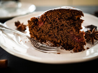Brownie - chocolate cake on black background 