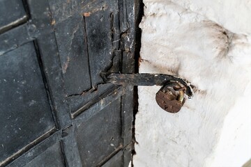 Russia, Rostov, July 2020. Medieval vintage door with a rusty lock.