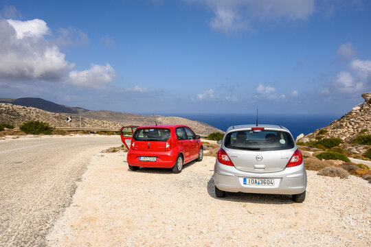Ios, Greece - September 21, 2020: Opel Corsa and Seat Mii on the road in the east part of Ios Island. Cyclades, Greece