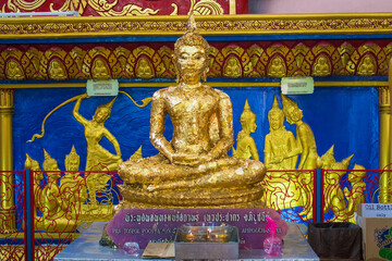 Buddha statue and Columbarium in the  Thai buddhist Temple Wat Chayamangkalaram, Penang island, Malaysia