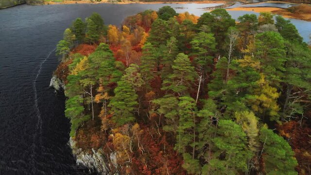 A beautiful closing up drone shot of the lake island