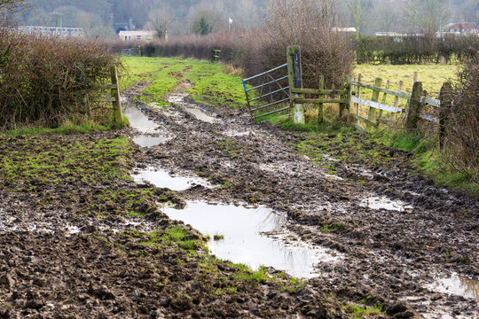 Waterlogged muddy field entrance example