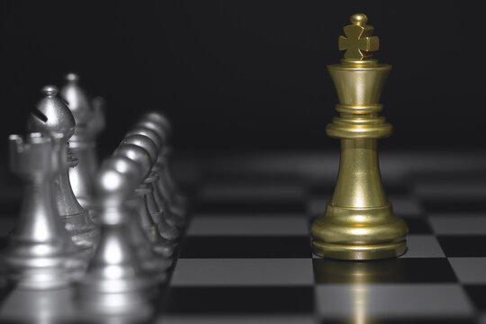 Shot of chessboard golden king moving. Concept for strategy, business victory.