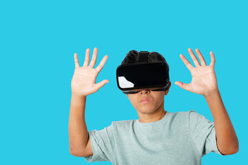 man using virtual reality headset isolated on blue background. clipping paths.