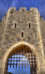 Fototapeta premium Portcullis of First defence tower. Besalu, Spain