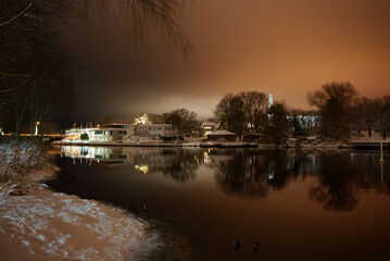 Fototapeta premium Night Pirita river at winter time.
