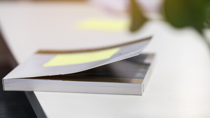 Publication book or documents report papers waiting be managed on desk in library desk on blur background