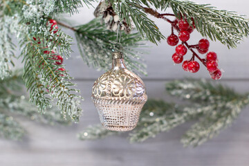 Old soviet decoration on the Christmas tree, glass toy flower basket close up on light background