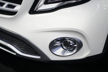 Obraz na płótnie Canvas Luxury car fog light in the white luxury car.