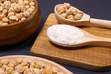 flour Chickpea in wooden background. natural vegetarian vegetable protein.